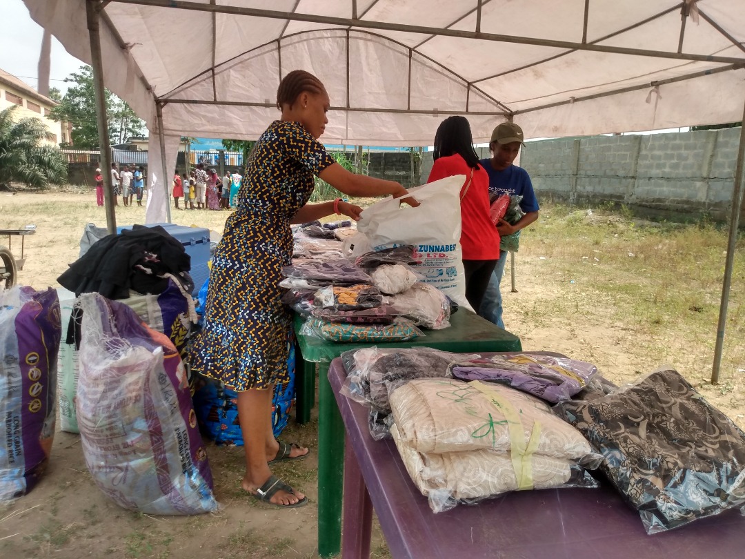 Volunteers packing food and essential supplies